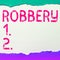 Handwriting text Robbery. Word for the action of taking property unlawfully from a person or place by force or threat of