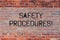 Handwriting text Safety Procedures. Concept meaning Follow rules and regulations for workplace security Brick Wall art