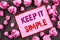 Handwriting text showing Keep It Simple. Business photo showcasing Simplicity Easy Strategy Approach Principle written on Pink Sti