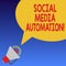Handwriting text Social Media Automation. Concept meaning Automation of posting content to social media Megaphone with