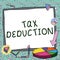Handwriting text Tax Deduction. Conceptual photo amount subtracted from income before calculating tax owe