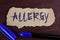 Handwriting text writing Allergy. Concept meaning damages in immunity due to hypersensitivity get it diagnised written on Tear Car