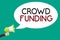 Handwriting text writing Crowd Funding. Concept meaning Fundraising Kickstarter Startup Pledge Platform Donations Man holding mega