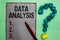 Handwriting text writing Data Analysis. Concept meaning Translate numbers to Analytical Conclusion Forecasting Gray paper marker c