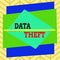 Handwriting text writing Data Theft. Concept meaning illegal transfer of any information that is confidential Asymmetrical uneven
