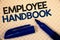 Handwriting text writing Employee Handbook. Concept meaning Document Manual Regulations Rules Guidebook Policy Code Text two Words