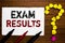 Handwriting text writing Exam Results. Concept meaning An outcome of a formal test that shows knowledge or ability Paper markers c