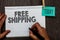 Handwriting text writing Free Shipping. Concept meaning Freight Cargo Consignment Lading Payload Dispatch Cartage Open