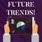 Handwriting text writing Future Trends. Concept meaning forecasts affecting technology customers and business Hands