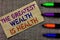 Handwriting text writing The Greatest Wealth Is Health. Concept meaning being in good health is the prize Take care Paperboard com
