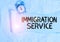 Handwriting text writing Immigration Service. Concept meaning responsible for law regarding immigrants and immigration