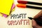 Handwriting text writing Profit Growth. Concept meaning Financial Success Increased Revenues Evolution Development written by Mark