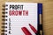 Handwriting text writing Profit Growth. Concept meaning Financial Success Increased Revenues Evolution Development written on Note
