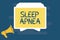 Handwriting text writing Sleep Apnea. Concept meaning The temporary stoppage of breathing during sleep Snoring