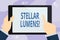 Handwriting text writing Stellar Lumens. Concept meaning cryptocurrency platform that uses on remittance and payments