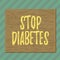 Handwriting text writing Stop Diabetes. Concept meaning prevent the disease of elevating glucose level in the blood Square