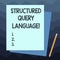 Handwriting text writing Structured Query Language. Concept meaning computer language for relational database Stack of Blank