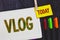 Handwriting text writing Vlog. Concept meaning Entertaining multimedia self broadcasting news reporting stories Papers marker pens