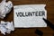 Handwriting text writing Volunteer. Concept meaning Volunteering individual for greater social cause serving others Ideas papers i