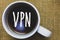 Handwriting text writing Vpn. Concept meaning Secured virtual private network across confidential domain protected Mug coffee thou