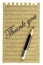Handwriting Thank you on a natural note paper and pencil