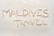 Handwriting words `Maldives travel`