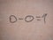 Handwritten in black felt-tip pen text on wall. 0 - 0 = 1. Mathematical equation. Fuzzy logic. Binary digits. Arithmetic