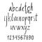 Handwritten calligraphic letters of the alphabet written with a