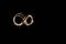 Handwritten infinite loop, light painting experiment with bulb exposure, at night. black background