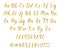 Handwritten latin calligraphy brush script with numbers and punctuation marks. Gold glitter alphabet. Vector