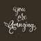 Handwritten lettering phrase You are awesome. Brush lettering calligraphy style writing.