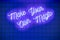 Handwritten neon glowing trendy text Make Your Own Magic on blue tiled wall