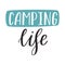 A handwritten phrase is Camping life. Hand lettering. Text element for cards, posters, banners on camping, tourism