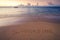 Handwritten Summertime on sandy beach at sunset