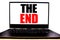 Handwritten text showing The End. Business concept writing for End Finish Close Written on monitor front screen, white background