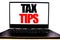 Handwritten text showing Tax Tips. Business concept writing for Tip Forn Taxes Written on monitor front screen, white background w