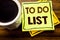 Handwritten text showing To Do List. Business concept for Plan Lists Remider written on sticky note paper on the wooden wood backg