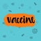 Handwritten VACCINE with virus on orang and blue background.