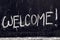 Handwritten Welcome message on chalkboard
