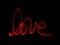 Handwritten word \'LOVE\'