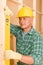 Handyman mature professional with spirit level