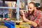 Handyman polishing wooden surface