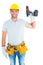 Handyman wearing tool belt while holding power drill