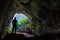 Hang En Cave - Silhouette of Man Standing Inside World's 3rd Largest Cave in Vietnam