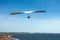 Hang-glider flies over the Punta Ballena cape, Uruguay