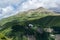 hang glider in spectacular green mountains on georgian military road in caucasus in geogria.