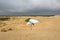 Hang glider student flies over sand dunes in North Carolina