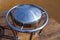 Hang pan Drum outdoors in public place. Zen-like modern trendy musical instrument. Fimbo and Glucophone