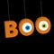 Hanging 3D word BOO text with eyeballs.