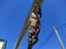 hanging attachment for a chain swing against the blue sky.